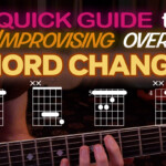 playing the chord changes on guitar